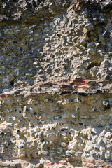 old stone bricks on roman wall