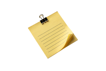 Yellow note with lines and a peeling corner, held by clip suggests written thoughts and constant updates, isolated on a transparent background