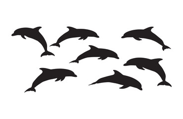 Fototapeta premium Dolphins in silhouette art highlighting aquatic elegance