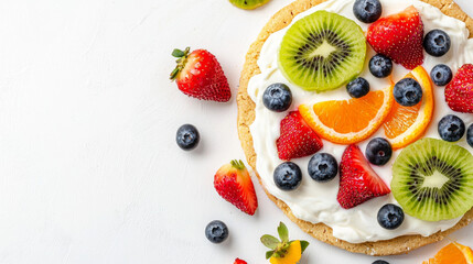 Close-up of colorful fruit pizza with kiwi, strawberries, oranges, and blueberries on creamy base. concept of creative desserts, fresh ingredients, artistic food presentation, healthy treats
