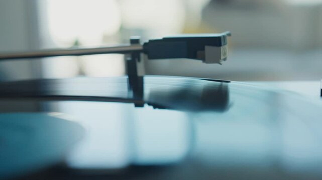 Vinyl record player needle reading vinyl record disc