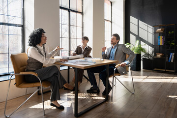 Architects discussing project during a meeting in the office