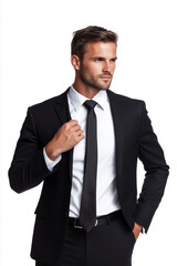 confident businessman adjusting tie in classic black suit stance
