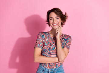 Photo of glamour cute minded girl wear stylish clothes hand touch face isolated on pink color...
