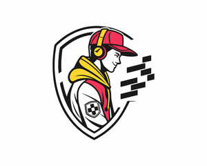 A stylized, profile view of a young male gamer, wearing a red hooded jacket, baseball cap, and headphones.