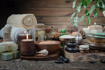 Spa massage items are arranged in a composition on the table.