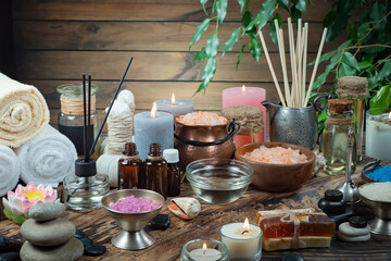 Spa massage items are arranged in a composition on the table.