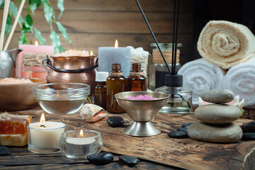 Spa massage items are arranged in a composition on the table.