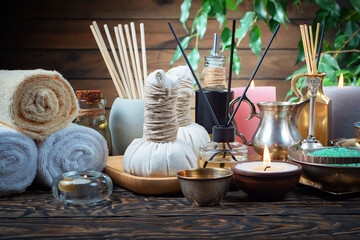 Spa massage items are arranged in a composition on the table.