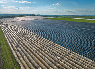 huge plastic covered asaragus fields in the fertile agricultural landscape of Langes Feld north of...