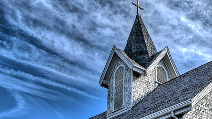 Dramatic Church Spire Against Dramatic Clouds