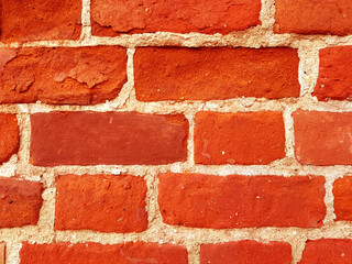 Close up red brick wall texture background.