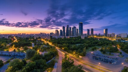 Fototapeta premium City skyline at dusk with vibrant colors and illuminated buildings in a bustling urban landscape