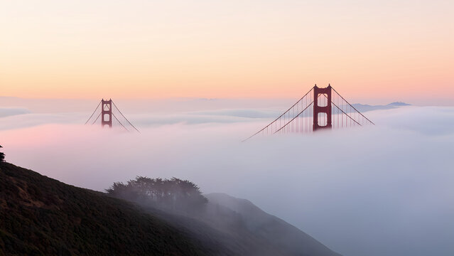 Foggy morning in San Francisco with Golden Gate Bridge emerging - Powered by Adobe