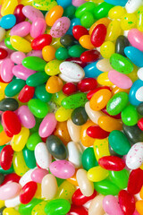 Colorful jelly beans isolated on white.