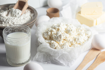 Baking Ingredients: Cottage Cheese, Flour, Milk, Eggs and Butter