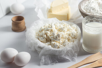 Baking Ingredients: Cottage Cheese, Flour, Milk, Eggs and Butter