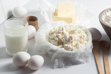 Baking Ingredients: Cottage Cheese, Flour, Milk, Eggs and Butter