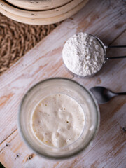 Fermenting Sourdough Starter Wild Yeast in a Kitchen Jar.