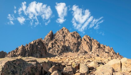 Fototapeta premium Rugged mountain peak under a clear sky