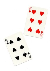 A pair of playing cards of the same value isolated on a white background.