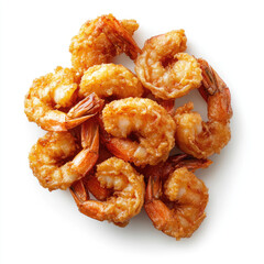 A top down view of a pile of golden brown crispy fried shrimp on a white surface