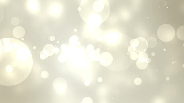 Light beige background with white bokeh, suitable for elegant and minimalistic design projects requiring a soft and subtle backdrop.