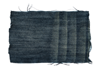 Piece of torn denim on a white background. Denim texture