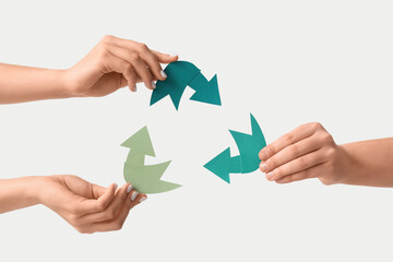 Female hands with recycle sign on white background. Ecology concept