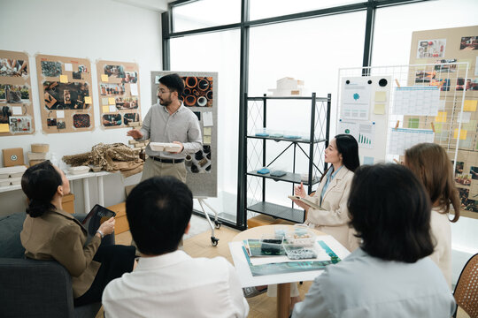 Creative team presentation on sustainable product design, highlighting eco-friendly materials, biodegradable packaging, and innovative concepts that promote environmental responsibility conscious