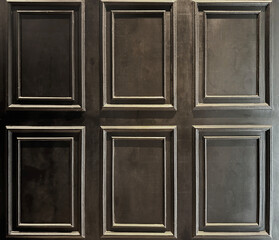 Classic wall molding in rectangular pattern and repeated, finished in dark black color paint. Good for wainscoting and wall panels. Seamless background texture.