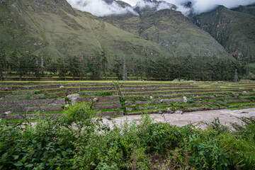 Fototapeta premium Inca ruins on the banks of the the Urubamba River in Peru