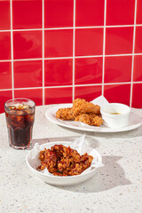 Diner cafe table served with fried chicken and soda water