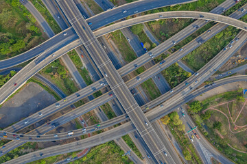 Aerial view of Expressway transport traffic road with vehicle movement in morning, Logistic concept.
