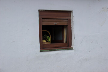 basket of fruit on a small window