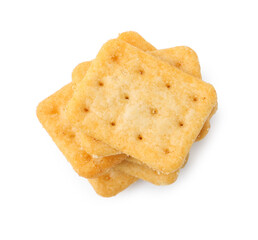 Tasty salty crackers isolated on white, top view