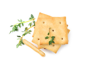 Tasty salty crackers with thyme isolated on white, top view