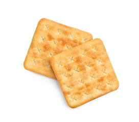 Tasty salty crackers isolated on white, top view