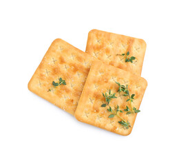 Tasty salty crackers with thyme isolated on white, top view