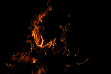 Fototapeta premium Flames Dance in Darkness Creating Beautiful, Abstract Fire Formations