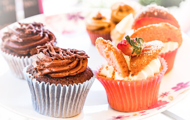 A Cake Stand Of Decorated Fairy Cakes