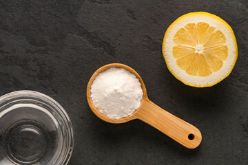 Citrus Limon - Baking soda in a bowl with lemon and vinegar