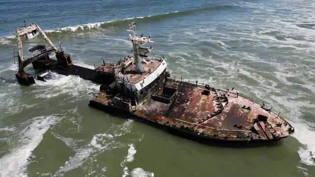 Aerial view of Zeila Shipwreck Namibia washed by waves on the South Atlantic Ocean in Skeleton Coast
