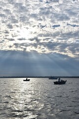 Naklejka premium Fishing at sunset