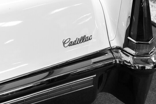 Limassol, Cyprus- December 19, 2024: Classic Cadillac Deville element logo name closeup displayed at Cyprus Motor Museum in black and white