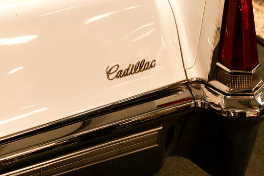 Limassol, Cyprus- December 19, 2024: Classic Cadillac Deville in creme color element logo name closeup displayed at Cyprus Motor Museum