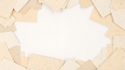 Abstract paper collage background with layered textures in shades of white and kraft brown perfect for creative projects