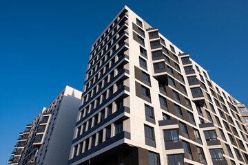 Facade of a modern apartment building. Construction of a residential complex. April 08, 2025 Almaty Kazakhstan
