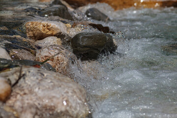 Boulders and stones in the river bed of the Soca river, Bovec, Slovenia,