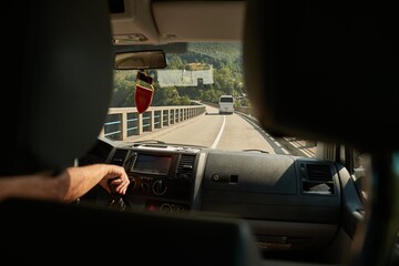 Road trip driving a van in the mountains